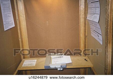 Close-up of a voting booth and ballot machine with ballot View Large Photo Image Stock Photo - Close-up of a voting booth and ballot machine with ballot. Fotosearch