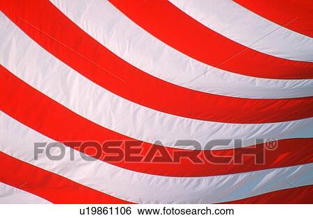 Close-up of stripes on American flag View Large Photo Image Stock Photograph - Close-up of stripes on American flag. Fotosearch
