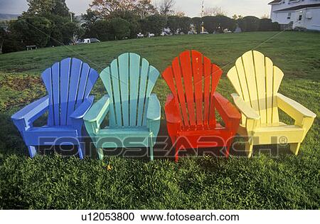 Colorful Adirondack Deck Chairs On A Lawn Stock Image U12053800