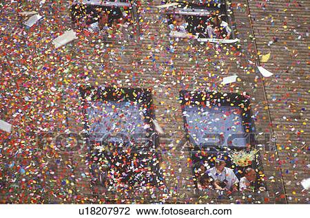 Stock Image - Confetti Falling From Building. Fotosearch