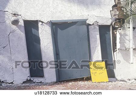 Stock Image - Damaged house in Los Angeles. Fotosearch