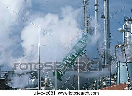 Earth day sign at an oil refinery View Large Photo Image Stock Image - Earth day sign at an oil refinery. Fotosearch