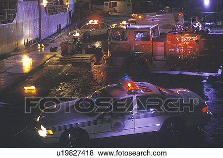 Emergency vehicles at dockside View Large Photo Image Stock Photo - Emergency vehicles at dockside. Fotosearch
