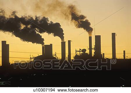 Factory at sunset View Large Photo Image Picture - Factory at sunset. Fotosearch