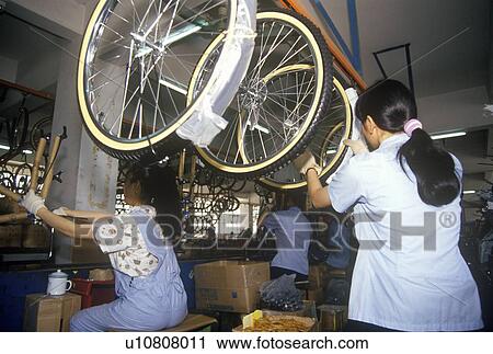 Stock Image - Factory workers. Fotosearch