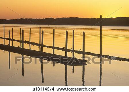 Fishing dock at sunset View Large Photo Image Picture - Fishing dock at sunset. Fotosearch