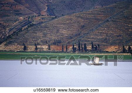 Fishing junk on Erhai Lake in Dali View Large Photo Image Stock Photo - Fishing junk on Erhai Lake in Dali. Fotosearch