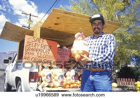 Stock Photo - Fruit Vendor. Fotosearch