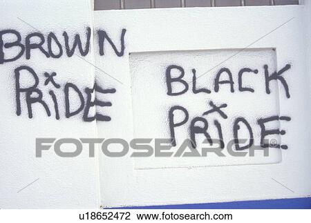 Stock Image - Graffiti reading? Brown pride, black pride?. Fotosearch