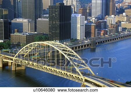 Stock Image - Liberty Bridge over Monongahela River at sunset with Pittsburgh skyline, PA. Fotosearch