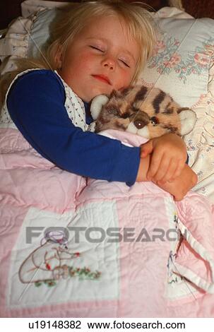 Little girl taking a nap View Large Photo Image Stock Image - Little girl taking a nap. Fotosearch