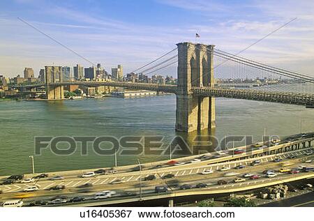 Long view of Brooklyn Bridge over East River to Brooklyn with FDR River, NY View Large Photo Image Stock Photo - Long view of Brooklyn Bridge over East River to Brooklyn with FDR River, NY. Fotosearch