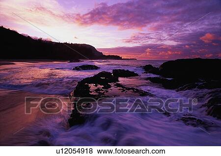 Stock Photo - Lumahai Beach on the north coast of Kauai at sunset. Fotosearch