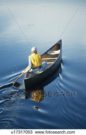 Man canoeing on Connecticut River View Large Photo Image Stock Image - Man canoeing on Connecticut River. Fotosearch