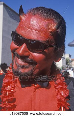 Stock Photography - Man dressed as Satan, the Devil. Fotosearch