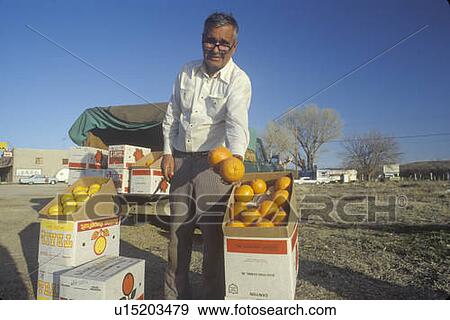 Man selling fruit View Large Photo Image Stock Photo - Man selling fruit. Fotosearch