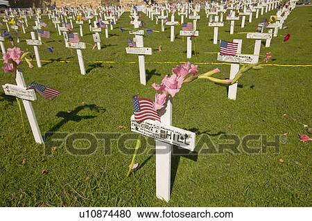 Stock Image - Mock grave markers of US soldiers who died in Iraq war at Arlington West, Santa Barbara, CA. Fotosearch