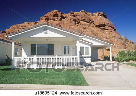 Picture - New housing development in a desert community. Fotosearch