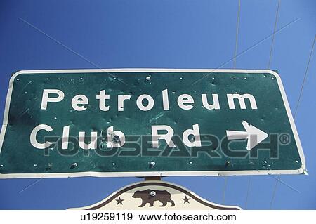Oil well sign at Taft in the Central Valley, CA View Large Photo Image Stock Photo - Oil well sign at Taft in the Central Valley, CA. Fotosearch