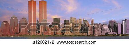 Panoramic view of Manhattan skyline at dusk View Large Photo Image Stock Image - Panoramic view of Manhattan skyline at dusk. Fotosearch