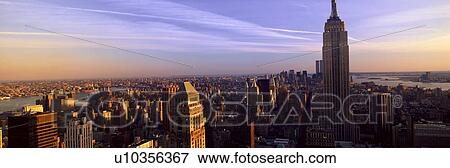 Panoramic view of New York City skyline with Empire State Building, Manhattan, NY View Large Photo Image Stock Photo - Panoramic view of New York City skyline with Empire State Building, Manhattan, NY. Fotosearch