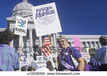 Protestors with signs at pro-choice rally at State Capitol Building View Large Photo Image Stock Photo - Protestors with signs at pro-choice rally at State Capitol Building. Fotosearch