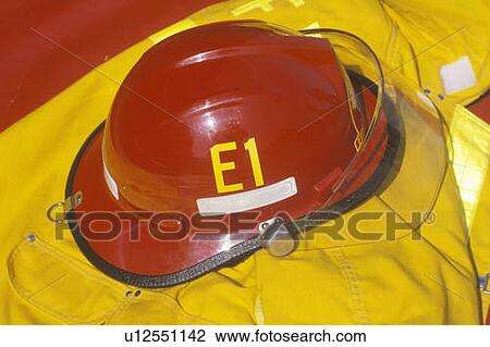 Red helmet and yellow jacket of fire fighter View Large Photo Image Stock Image - Red helmet and yellow jacket of fire fighter. Fotosearch