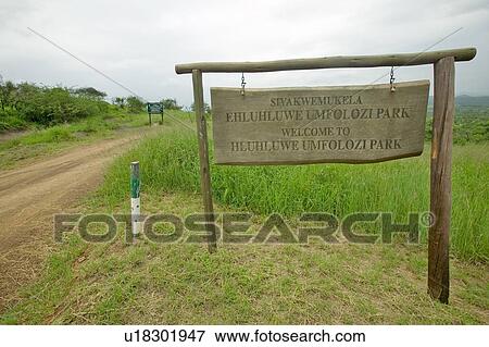 Sign reads Welcome to Hluhluwe Umfolozi Park, South Africa View Large Photo Image Stock Photo - Sign reads Welcome to Hluhluwe Umfolozi Park, South Africa. Fotosearch
