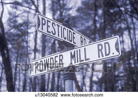 Sign that reads “Powder Mill Rd. and Pesticide Rd. ” View Large Photo Image Stock Image - Sign that reads “Powder Mill Rd. and Pesticide Rd. ”. Fotosearch