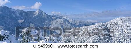 Stock Image - Snow-covered mountains in Sequoia National Park, California. Fotosearch