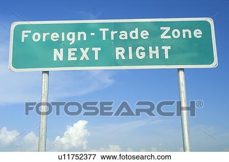 Stock Photo - Street sign Foreign-Trade Zone. Fotosearch