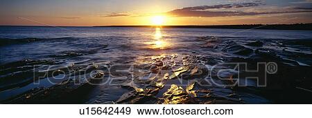 Sunrise at Lake Superior, Porcupine Mountain State Park, Upper Peninsula, Michigan View Large Photo Image Stock Photo - Sunrise at Lake Superior, Porcupine Mountain State Park, Upper Peninsula, Michigan. Fotosearch