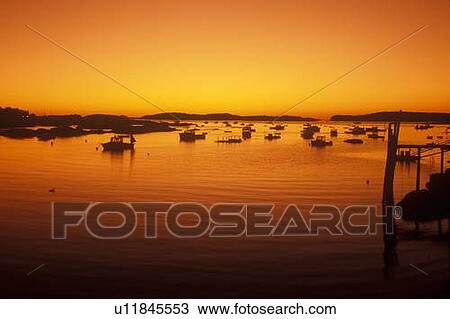 Sunrise over harbor in Stonington, ME View Large Photo Image Stock Image - Sunrise over harbor in Stonington, ME. Fotosearch