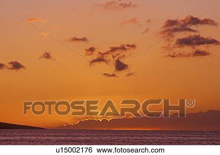 Stock Photograph - Sunset On The Pacific, Maui, Hawaii. Fotosearch