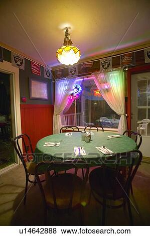 Table setting lit by electric light View Large Photo Image Stock Photo - Table setting lit by electric light. Fotosearch