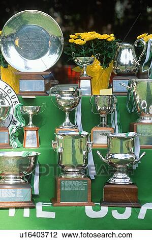 Stock Image - Tennis winner trophies on display. Fotosearch