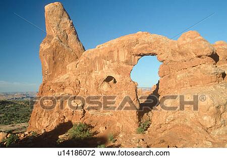 Stock Image - The Windows Arches at dawn, Arches National Park, Utah. Fotosearch