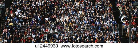 This is a crowd of people in the stands at the 109th Rose Bowl Parade on New Year's Day. View Large Photo Image Stock Image - This is a crowd of people in the stands at the 109th Rose Bowl Parade on New Year's Day. . Fotosearch