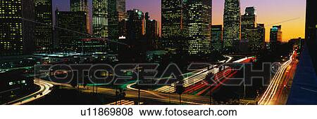 Stock Photo - This is a view of the Harbor Freeway with rush hour traffic at sunset. Fotosearch