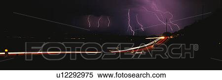 Stock Photography - This is an electrical storm over the city. Fotosearch