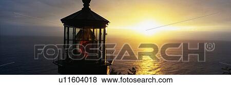 This is the Cape Meares Lighthouse at sunset View Large Photo Image Stock Photo - This is the Cape Meares Lighthouse at sunset. Fotosearch