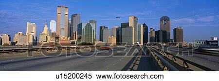 This is the freeway to the center of the city with the skyline in the background View Large Photo Image Stock Photography - This is the freeway to the center of the city with the skyline in the background. Fotosearch