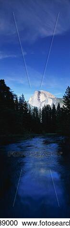 This is the Half Dome with the Merced River flowing in front of it. View Large Photo Image Stock Image - This is the Half Dome with the Merced River flowing in front of it.. Fotosearch
