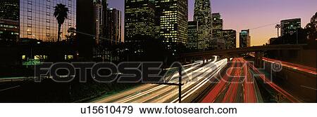 Stock Photo - This is the Harbor Freeway with rush hour traffic at sunset. Fotosearch