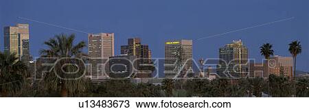 This is the skyline at dusk with palm trees surrounding the city. View Large Photo Image Stock Image - This is the skyline at dusk with palm trees surrounding the city.. Fotosearch