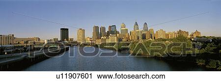 Stock Image - This is the skyline from the Schuylkill River at sunset.. Fotosearch