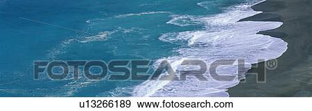 Stock Photo - This is the turquoise water of the Atlantic Ocean. Fotosearch