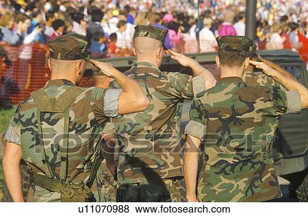 Stock Photo - Three United States Marines Saluting. Fotosearch
