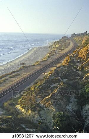 Train route along the San Diego coast at sunset, San Diego, California View Large Photo Image Stock Photo - Train route along the San Diego coast at sunset, San Diego, California. Fotosearch