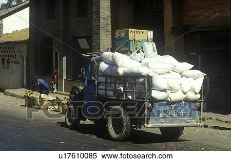 Stock Photography - Truck transporting goods in Dali, Yunnan Province, People's Republic of China. Fotosearch